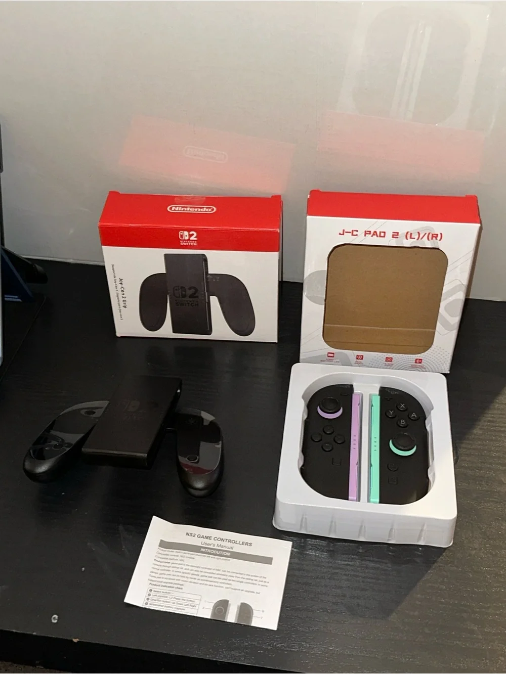Nintendo Wireless Joy-Con Blue and Orange Accents with Nintendo game grip